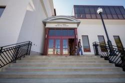 Cali School of Music Front Doors with student